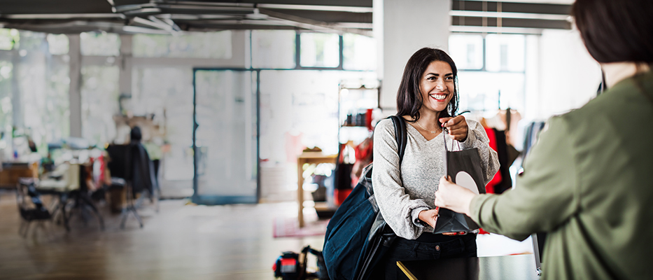 Father and daughter using headset happily; image used for HSBC IN Debit Cards page